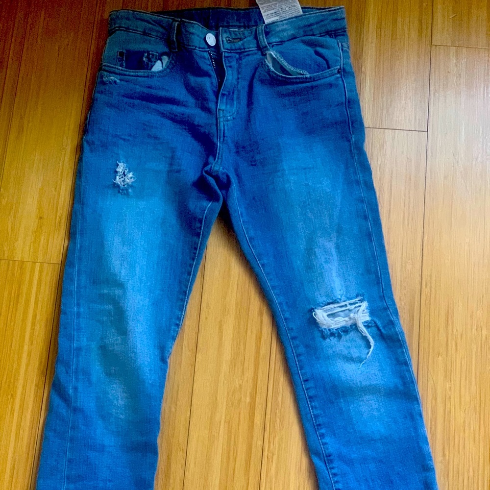 Ripped blue jeans skinny fit